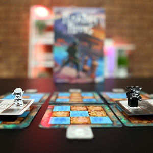 Example of setup of Floating Floors the game. Two ninjas primed to race for each other's bansen tokens. Ninja meeple and floor boards are balanced on top of terrain cards.